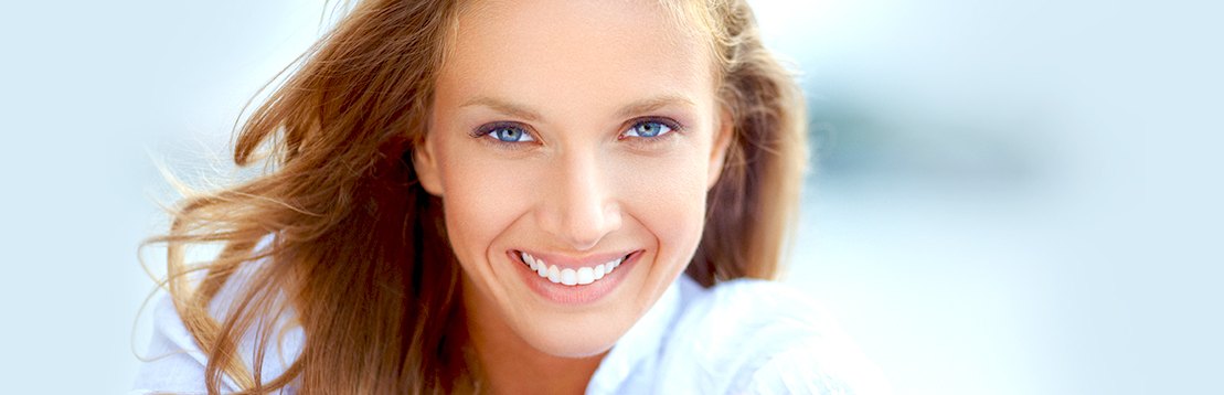 model smiling into camera